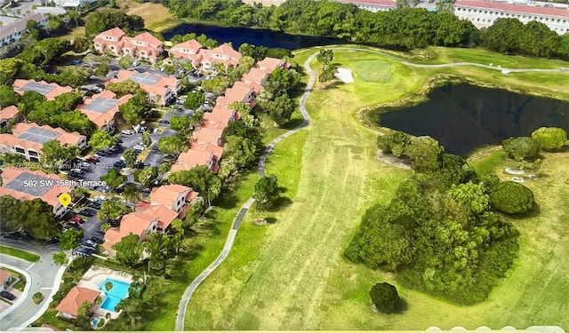 502 SW 158th Ter Unit 203, Pembroke Pines, FL 33027 - aerial view of property and surrounding area with a nearby body of water, nearby suburban area, and a local golf course