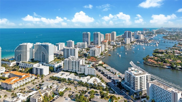 drone / aerial view with a water view and a city view