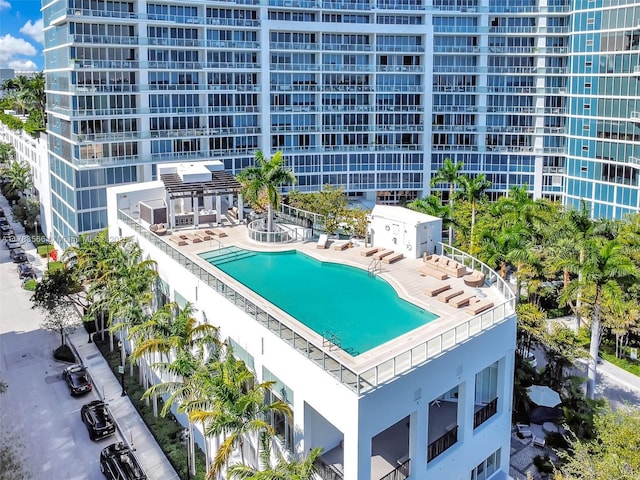 community pool with a patio area