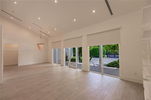8200 SW 62nd Ave, Miami, FL 33143 - unfurnished room with visible vents, light wood-style floors, baseboards, high vaulted ceiling, and recessed lighting