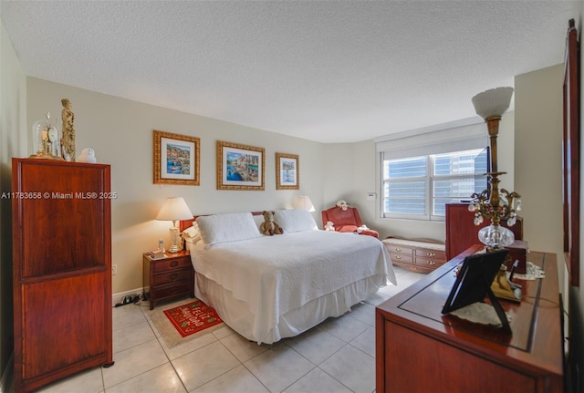 1950 S Ocean Dr Unit 17E, Hallandale Beach, FL 33009 - bedroom with a textured ceiling and light tile patterned flooring