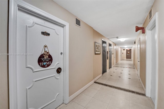1401 S Ocean Dr Unit 902, Hollywood, FL 33019 - corridor featuring light tile patterned flooring and baseboards