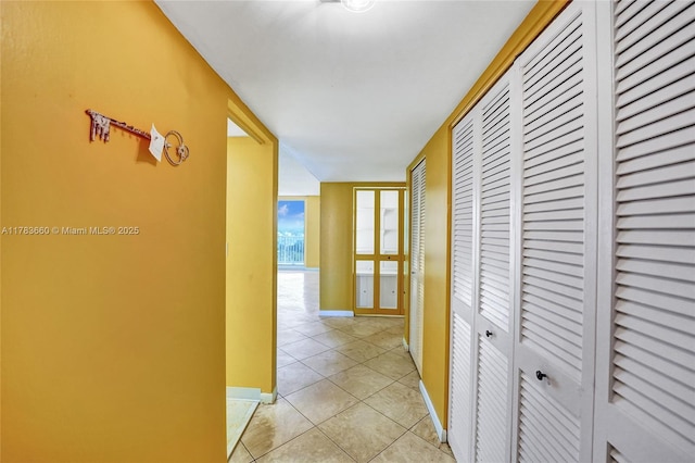 1401 S Ocean Dr Unit 902, Hollywood, FL 33019 - hall featuring light tile patterned flooring and baseboards