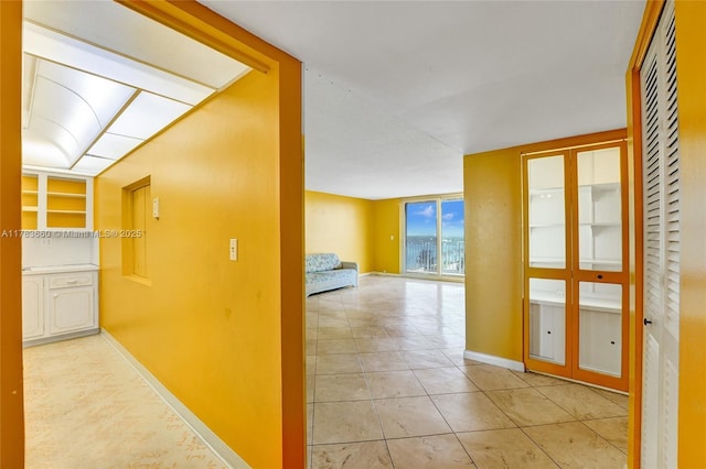 1401 S Ocean Dr Unit 902, Hollywood, FL 33019 - hall with baseboards and tile patterned floors