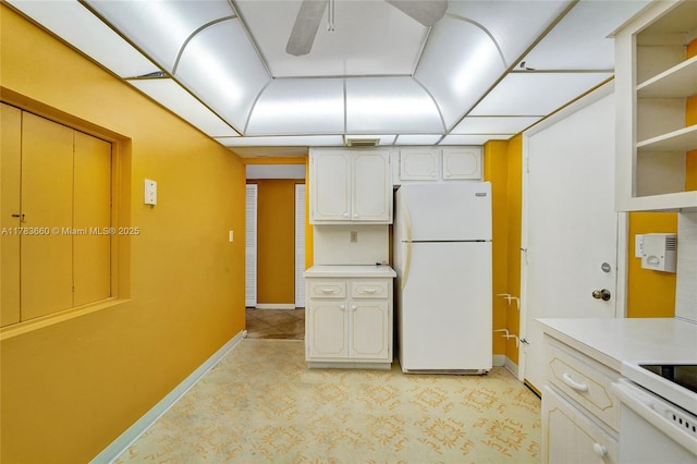 1401 S Ocean Dr Unit 902, Hollywood, FL 33019 - kitchen with freestanding refrigerator, light countertops, a ceiling fan, baseboards, and light colored carpet