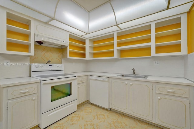 1401 S Ocean Dr Unit 902, Hollywood, FL 33019 - kitchen with white appliances, a sink, open shelves, light countertops, and range hood