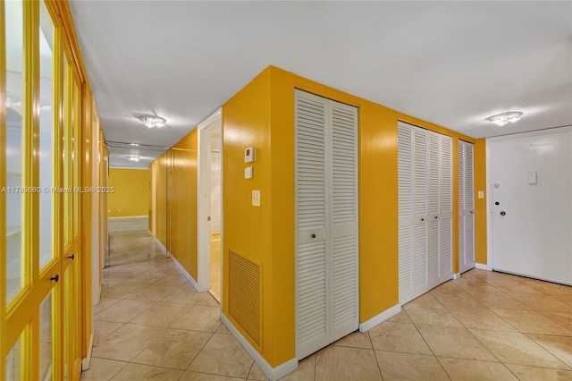 1401 S Ocean Dr Unit 902, Hollywood, FL 33019 - hallway with light tile patterned floors and baseboards