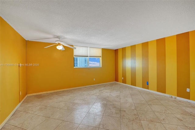 1401 S Ocean Dr Unit 902, Hollywood, FL 33019 - empty room with ceiling fan, a textured ceiling, and baseboards