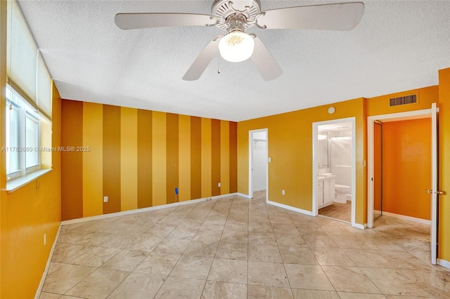 1401 S Ocean Dr Unit 902, Hollywood, FL 33019 - empty room featuring a textured ceiling, ceiling fan, and baseboards