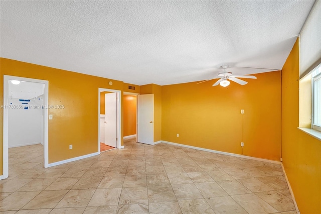 1401 S Ocean Dr Unit 902, Hollywood, FL 33019 - spare room with ceiling fan, a textured ceiling, and baseboards