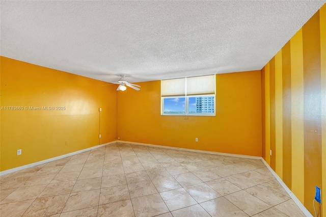 1401 S Ocean Dr Unit 902, Hollywood, FL 33019 - empty room with a textured ceiling, a ceiling fan, and baseboards
