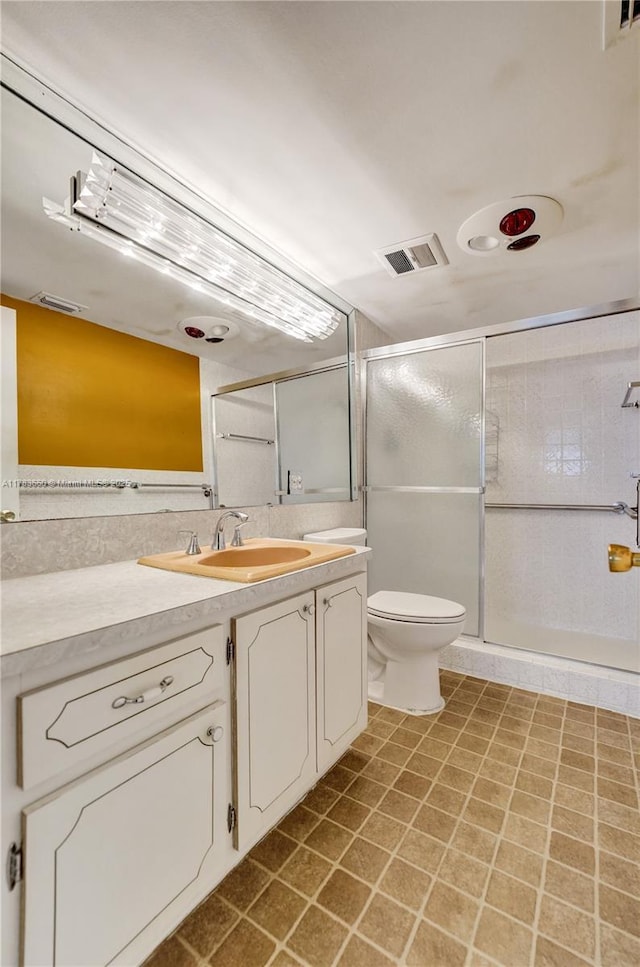 1401 S Ocean Dr Unit 902, Hollywood, FL 33019 - bathroom with vanity, toilet, and a shower stall