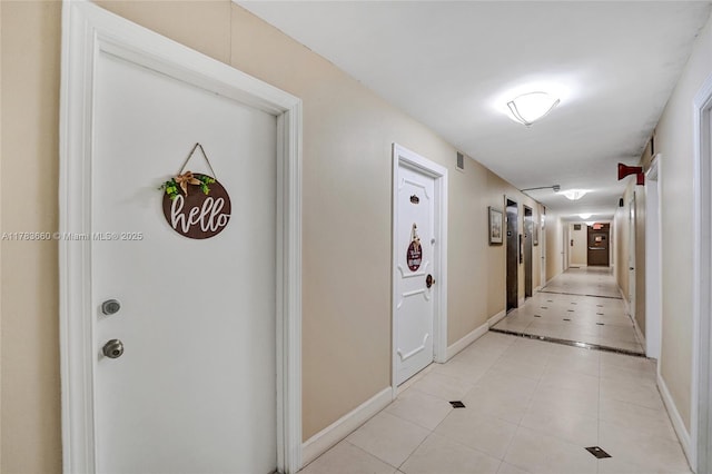 1401 S Ocean Dr Unit 902, Hollywood, FL 33019 - corridor featuring light tile patterned floors and baseboards