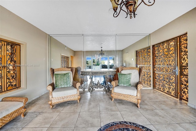 1401 S Ocean Dr Unit 902, Hollywood, FL 33019 - sitting room with a chandelier and tile patterned floors