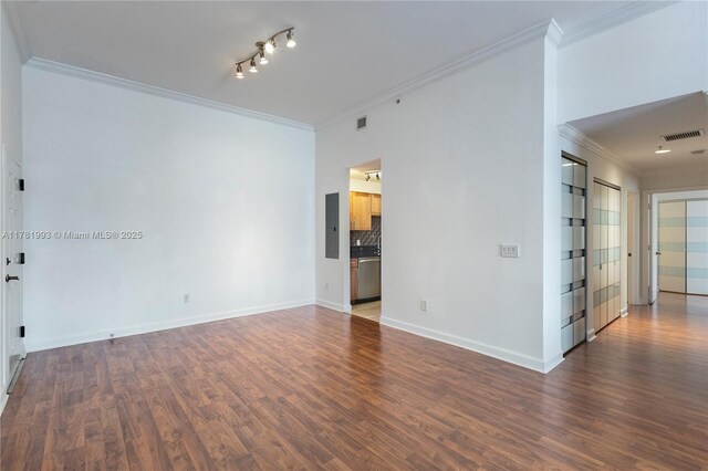 8390 SW 72nd Ave Unit 517, Miami, FL 33143 - empty room with crown molding, wood finished floors, and electric panel