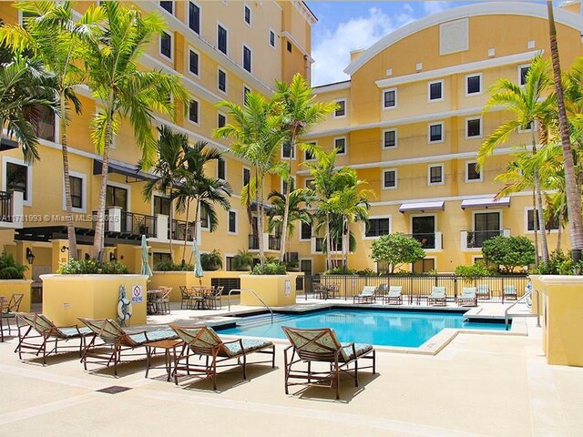 8390 SW 72nd Ave Unit 517, Miami, FL 33143 - community pool featuring a patio area