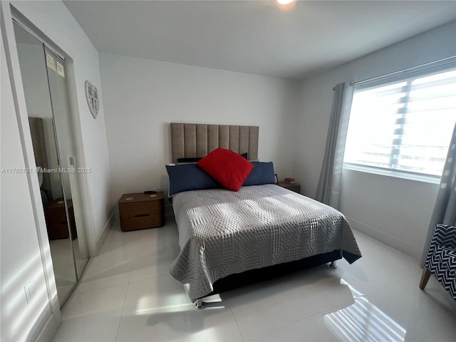 10950 NW 82nd St Unit 420, Doral, FL 33178 - bedroom with tile patterned floors
