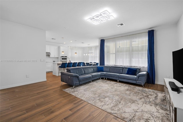 1705 Trailhead Ter, Hollywood, FL 33021 - living room with dark wood-type flooring, baseboards, and visible vents