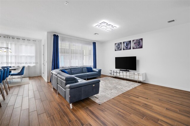 1705 Trailhead Ter, Hollywood, FL 33021 - living area featuring visible vents, baseboards, and wood finished floors