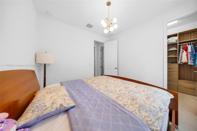 1705 Trailhead Ter, Hollywood, FL 33021 - bedroom with a closet, a notable chandelier, a spacious closet, and visible vents