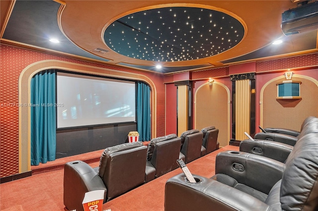 cinema featuring carpet flooring, wallpapered walls, and a raised ceiling