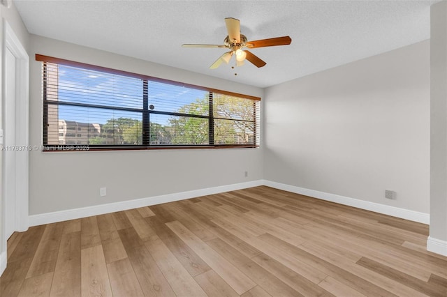 10400 NW 30th Ct Unit 203, Sunrise, FL 33322 - spare room featuring a ceiling fan, a healthy amount of sunlight, and light wood-style floors