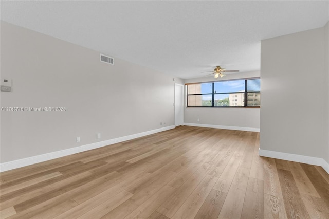 10400 NW 30th Ct Unit 203, Sunrise, FL 33322 - spare room with a ceiling fan, baseboards, visible vents, and light wood-type flooring