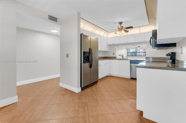 10400 NW 30th Ct Unit 203, Sunrise, FL 33322 - kitchen with visible vents, baseboards, white cabinetry, a sink, and appliances with stainless steel finishes