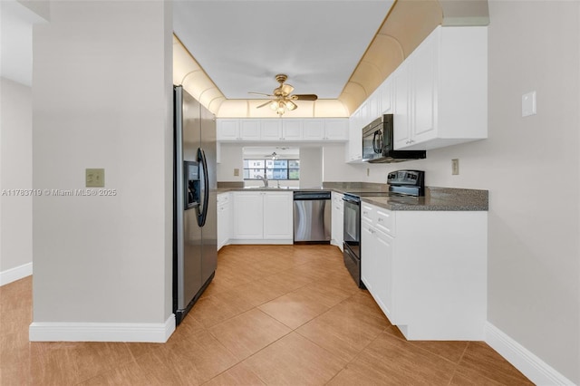 10400 NW 30th Ct Unit 203, Sunrise, FL 33322 - kitchen with white cabinets, ceiling fan, dark countertops, a sink, and black appliances