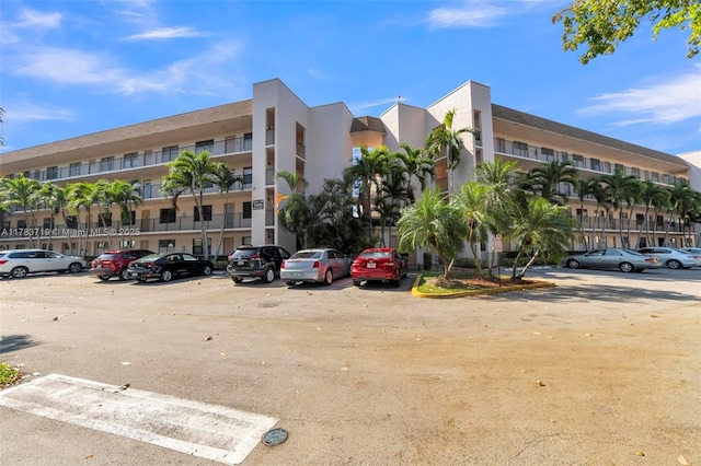 10400 NW 30th Ct Unit 203, Sunrise, FL 33322 - view of property featuring uncovered parking