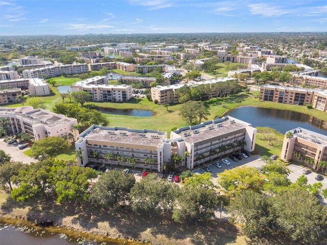 10400 NW 30th Ct Unit 203, Sunrise, FL 33322 - drone / aerial view featuring a water view