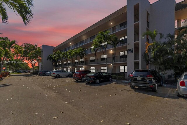 10400 NW 30th Ct Unit 203, Sunrise, FL 33322 - view of building exterior with uncovered parking