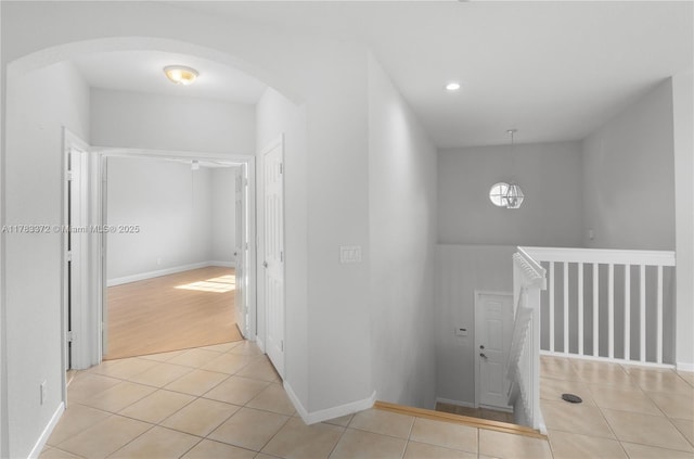 922 NW 127th Ave, Coral Springs, FL 33071 - hallway with light tile patterned floors and arched walkways