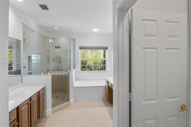 922 NW 127th Ave, Coral Springs, FL 33071 - full bath featuring vanity, a stall shower, a garden tub, tile patterned floors, and recessed lighting