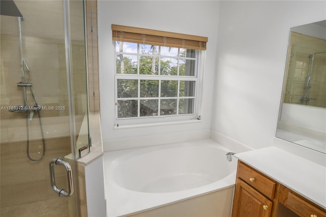 922 NW 127th Ave, Coral Springs, FL 33071 - bathroom featuring healthy amount of natural light, a bath, a stall shower, and vanity