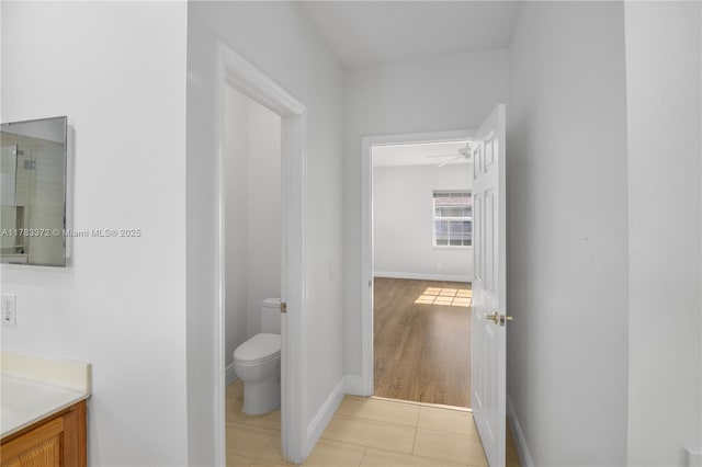 922 NW 127th Ave, Coral Springs, FL 33071 - bathroom featuring vanity, tile patterned floors, and a ceiling fan