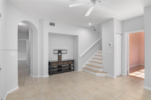 922 NW 127th Ave, Coral Springs, FL 33071 - interior space with ceiling fan, arched walkways, stairs, light tile patterned floors, and recessed lighting