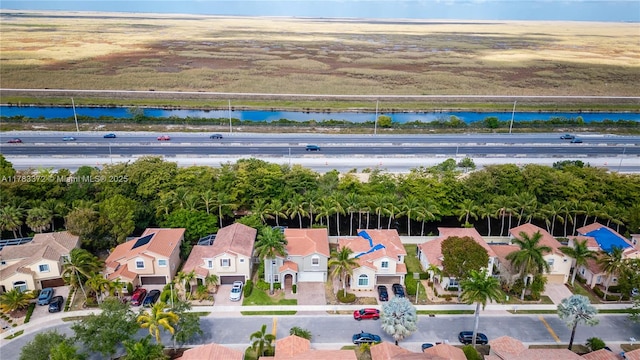 922 NW 127th Ave, Coral Springs, FL 33071 - aerial perspective of suburban area with a large body of water