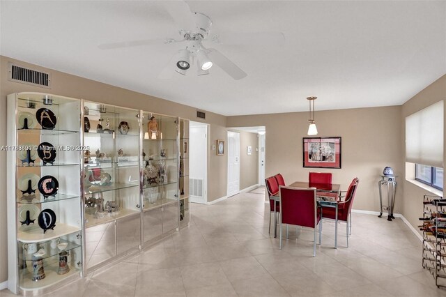 10451 Sunrise Lakes Blvd Unit 401, Sunrise, FL 33322 - tiled dining space featuring visible vents, baseboards, and ceiling fan