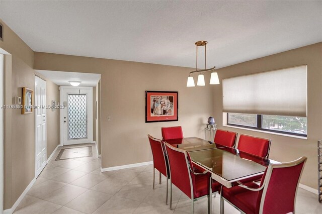 10451 Sunrise Lakes Blvd Unit 401, Sunrise, FL 33322 - tiled dining room with baseboards