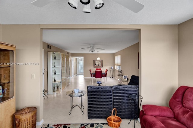 10451 Sunrise Lakes Blvd Unit 401, Sunrise, FL 33322 - living room featuring ceiling fan and visible vents