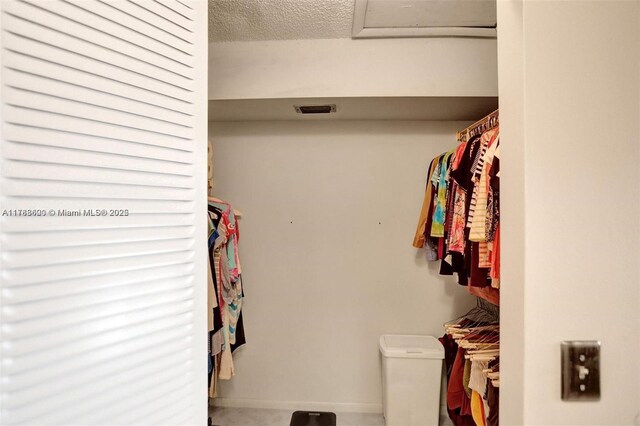 10451 Sunrise Lakes Blvd Unit 401, Sunrise, FL 33322 - walk in closet with attic access and visible vents