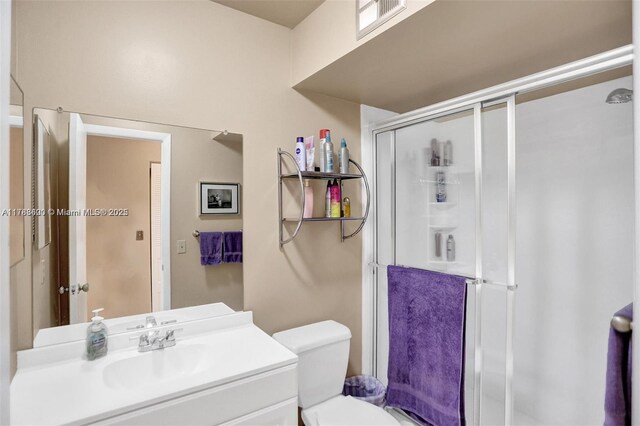 10451 Sunrise Lakes Blvd Unit 401, Sunrise, FL 33322 - full bath with toilet, vanity, visible vents, and a stall shower