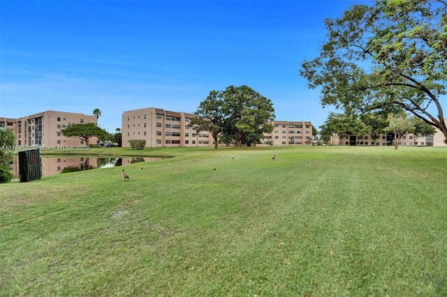 10451 Sunrise Lakes Blvd Unit 401, Sunrise, FL 33322 - view of yard featuring a water view
