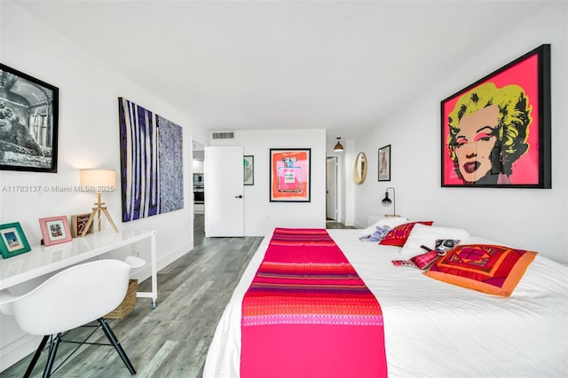 8233 Harding Ave Unit 607, Miami Beach, FL 33141 - bedroom with visible vents and wood finished floors