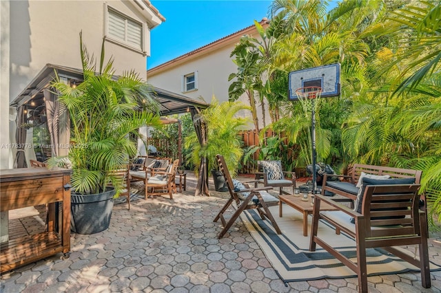 view of patio with a gazebo and fence