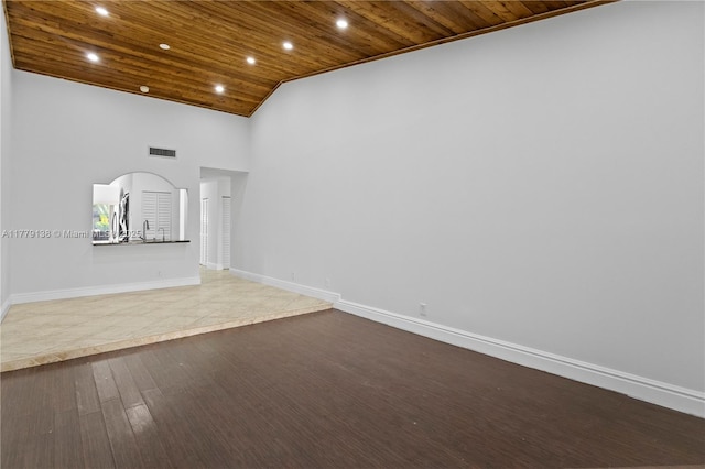 unfurnished living room with baseboards, visible vents, recessed lighting, wood ceiling, and high vaulted ceiling
