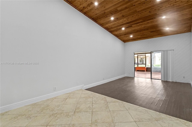 spare room with recessed lighting, tile patterned floors, baseboards, wood ceiling, and high vaulted ceiling