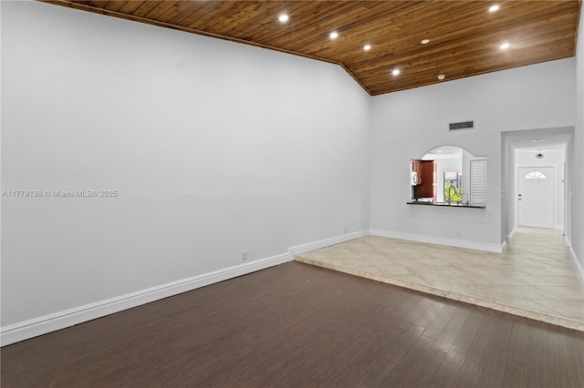 spare room featuring high vaulted ceiling, baseboards, wooden ceiling, and recessed lighting