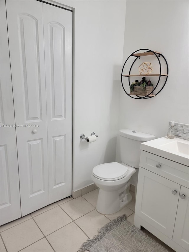 3708 NE 22nd Pl, Homestead, FL 33033 - half bath with vanity, toilet, baseboards, and tile patterned floors